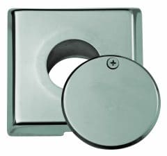 A polished chrome square escutcheon plate with a central circular opening, accompanied by a detached round chrome cover with a single screw head, displayed on a neutral white background.