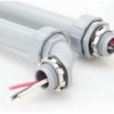 Two gray corrugated electrical conduit assemblies extend diagonally, their metal locknut fittings securing ends while red, white and black insulated wires protrude; photographed on a clean white surface.