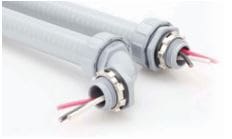 Two gray corrugated electrical conduit assemblies extend diagonally, their metal locknut fittings securing ends while red, white and black insulated wires protrude; photographed on a clean white surface.