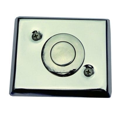 Chrome rectangular wall plate with a central circular push button, secured by two Phillips screws, reflecting light and showing smudges, isolated against a plain white background.
