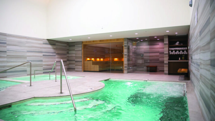 Indoor whirlpool spa pool with LED lighting