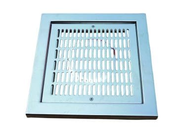 Square stainless-steel vent or grate sits flat, covering an opening with parallel oval slots and visible screws, photographed isolated against a plain white background.