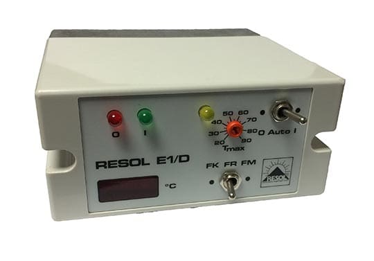 White rectangular RESOL E1/D controller sits angled, showing red and green LEDs, a yellow indicator, orange temperature dial, toggle switches, small digital °C display and RESOL logo; Text: RESOL E1/D, °C, Tmax, Auto I, 20 30 40 50 60 70 80, FK FR FM, O I, RESOL.