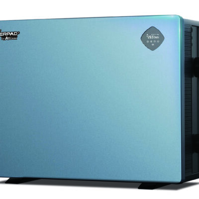 A pale-blue rectangular INVERPAD® by Aquark heat-pump unit sits on short feet, showing a top-right digital display reading "26.5 28.0°C", with right-side vents and two pipe fittings visible against white.